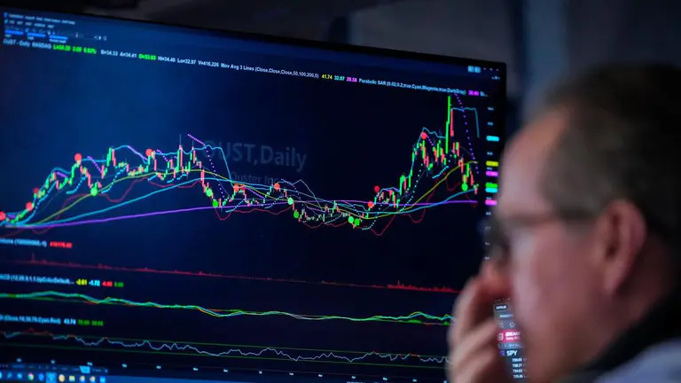 Nasdaq ends down as chipmakers fall