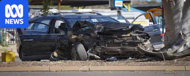 NT Police find driver at crash scene with stab wounds, arrest 22yo suspect
