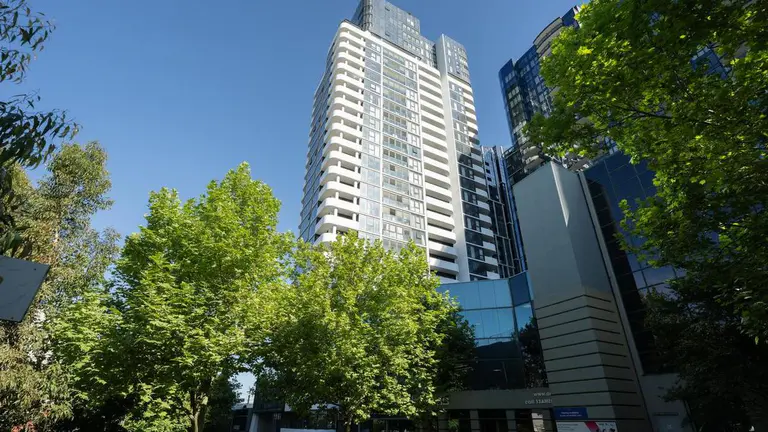 Woman and child found dead outside high-rise apartment