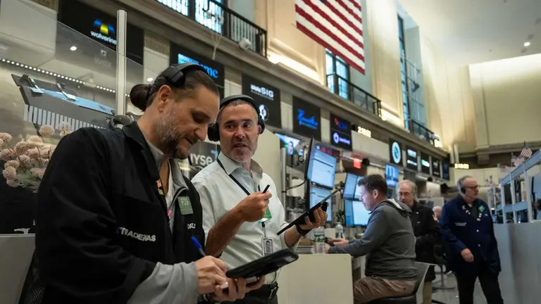 Dow outperforms as Wall Street rises