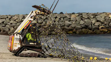 Critical netted shark barriers back in the ocean across Perth beaches as shark fears remain high