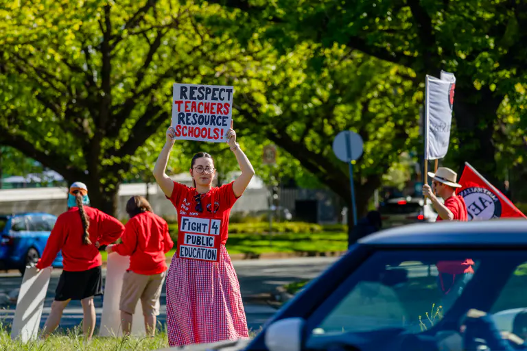 ‘Fed up’ public school teachers take to the streets as threat of Term 4 full-day strike looms