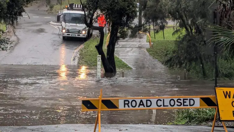 Residents on ‘prepare to leave’ orders as heavy rain causes flash flooding across South East Queensland
