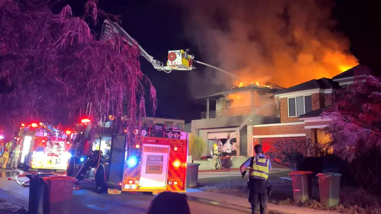 Mt Pleasant house fire suspected arson after neighbours hear loud bang and car flee scene