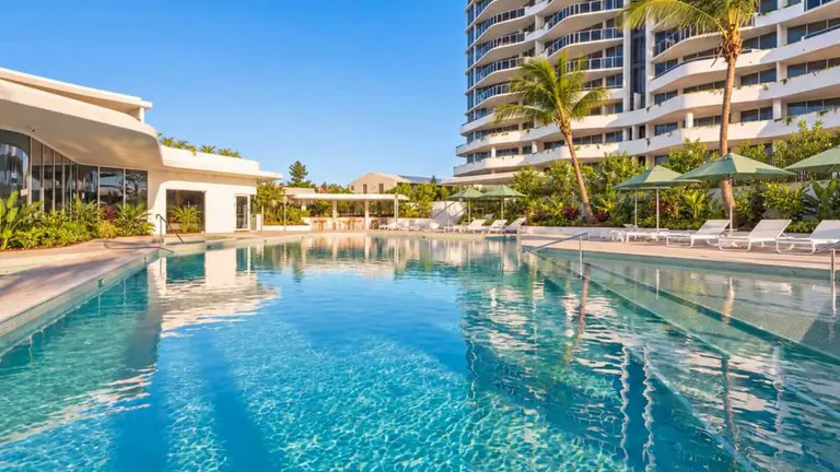 Developer Andrews launches completed Cascade Robina apartments offering resort living from $1.21m