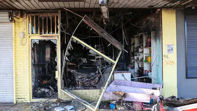Manhunt after suspicious fire tears through grocery store in Deer Park