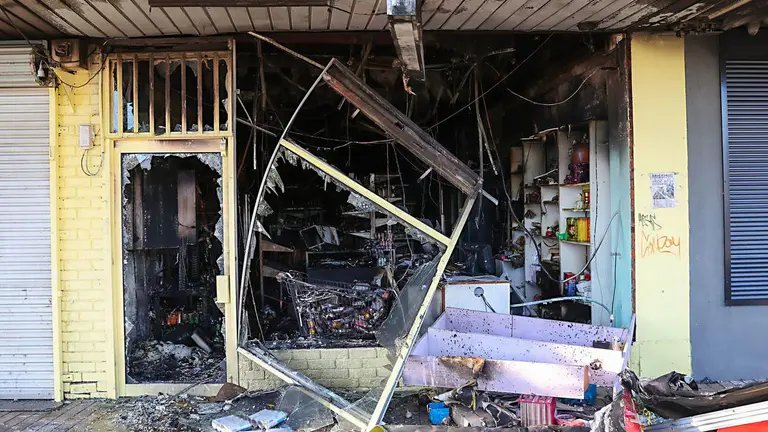 Manhunt after suspicious fire tears through grocery store in Deer Park