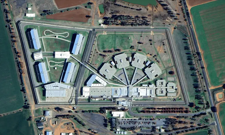 Junee prison numbers surge towards 1,000 after transfers complete