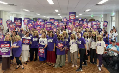 Dolly Parton flash mob highlights pressures on community sector workers
