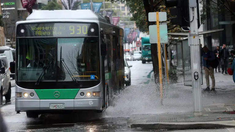 Perth weather: City wakes to deluge as cold front hits, spurring urgent warning to drivers