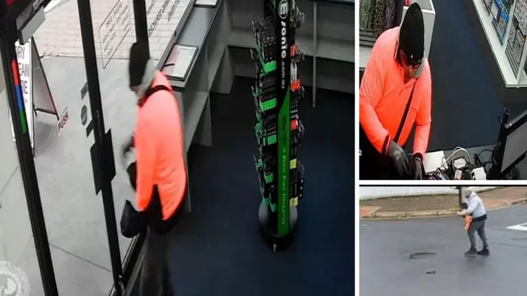 Bizarre moment wannabe post office robber in Adelaide rejected, strips off