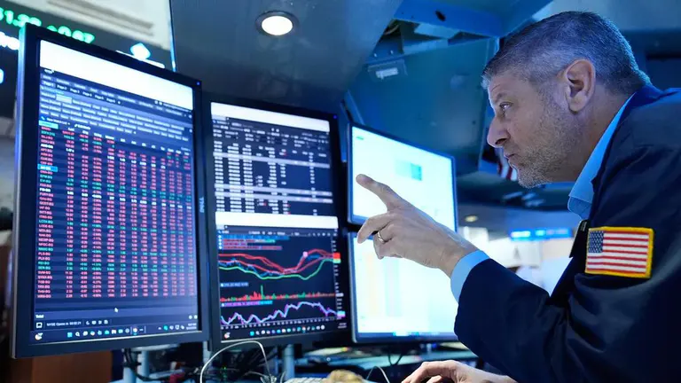 Wall St higher as traders shift from AI to healthcare