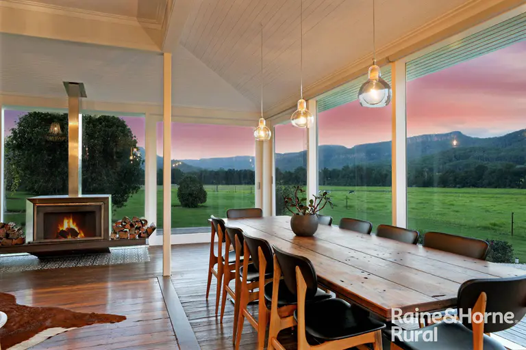 This floor-of-the-valley acreage will take your breath away from every room