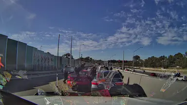 Dash-cam footage reveals dramatic WA Police arrest of Ford Falcon driver on Warwick Mitchell Freeway ramp
